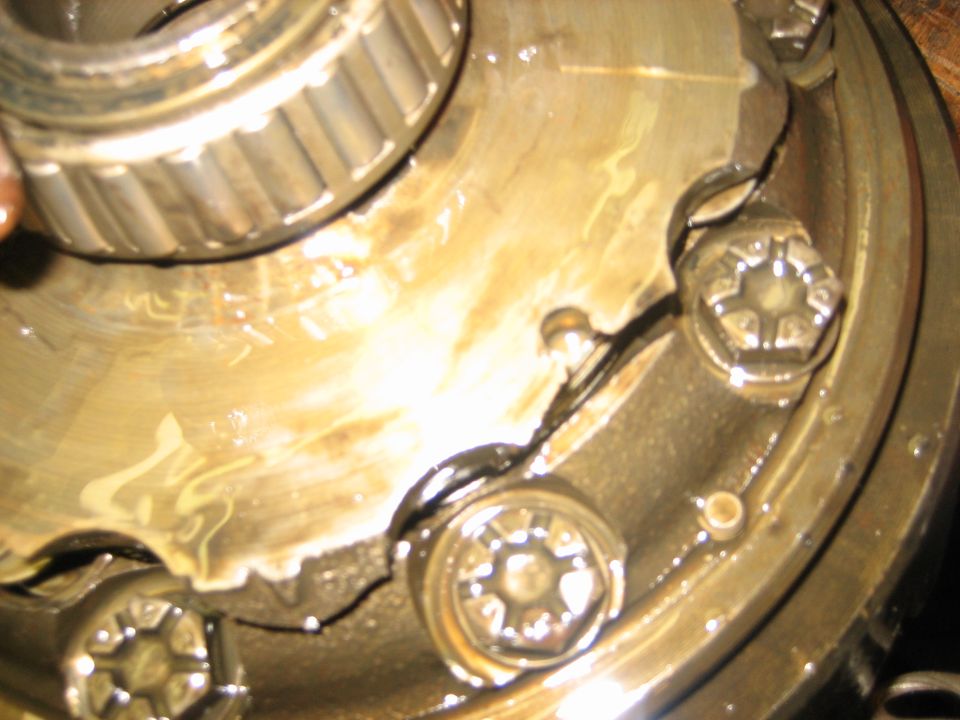 Close-up of broken gear teeth inside a differential housing
