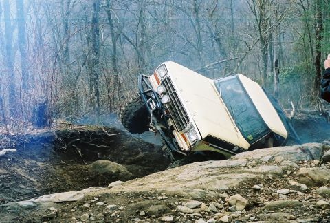 1978 Ford Bronco - This vehicle is navigating a challenging rocky trail, with its tires on large boulders.
