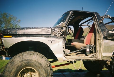 1978 Ford Bronco - This heavily modified SUV features a roll cage and large off-road tires, suggesting it's built for terrain.