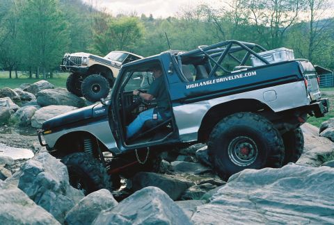 1978 Ford Bronco - This 1980s Ford Bronco navigates a challenging, rocky landscape.
