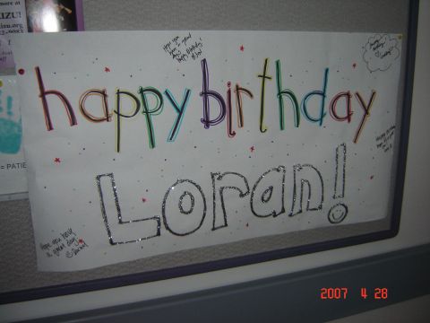 1993 Ford Bronco - A colorful, handwritten birthday card for Loran is displayed on a bulletin board.