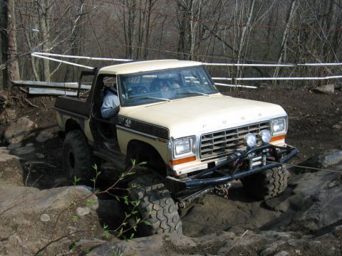 1992 Ford Mustang - This modified 1979 Ford F-150 navigates a rocky trail, its off-road capabilities.