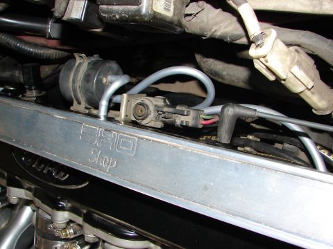 1992 Ford Taurus - Engine bay details show various components and a decorative metal bar with "SHO Shop" text.