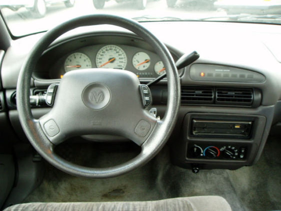 Volkswagen steering wheel and instrument cluster with center radio and rotary climate controls