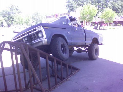 1995 Ford Bronco - This lifted 1979 Ford F-Series pickup truck is positioned on a metal ramp.