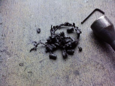 1995 Ford Bronco - Debris and a hex wrench on a surface.