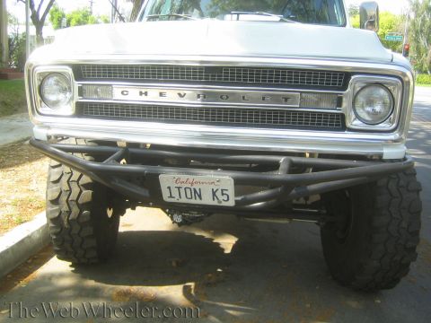 1968 Ford Mustang - This Chevrolet pickup truck features a custom front bumper and aggressive off-road tires, indicating it's built for terrain.