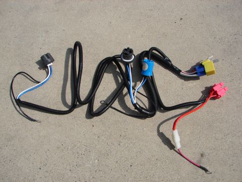 1992 Ford Taurus - This is a wiring harness with various colored wires and connectors, likely for vehicle lighting or electrical components.