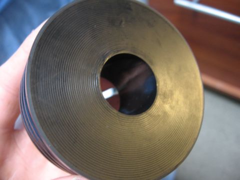 1974 Ford F-100 - This image shows a close-up view of a ribbed pulley, a common automotive part.