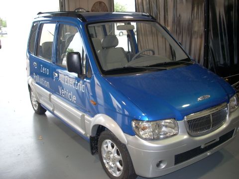 1992 Ford Bronco - This electric vehicle is blue with silver trim and has "Zero Pollution All Electric Vehicle" written on its side.