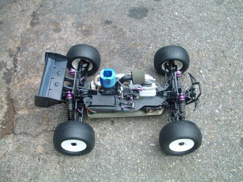 1994 Ford Bronco - This is a remote control car with a blue engine and large tires, viewed from above. The registry information for this vehicle is incorrect.