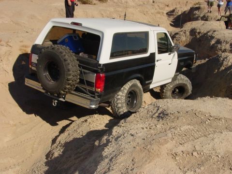 1994 Ford Bronco - This Ford Bronco is navigating a challenging off-road course.