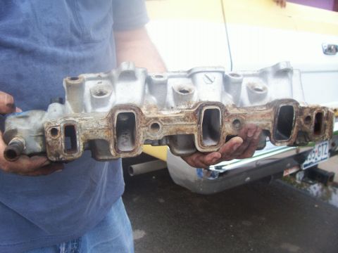 1997 Dodge Intrepid - Me holding the intake manifold again, this shows the passenger side ports.