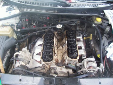 1997 Dodge Intrepid - This is what the engine looks like after the valve covers and intake manifold are removed, but the valley pan is still in place.