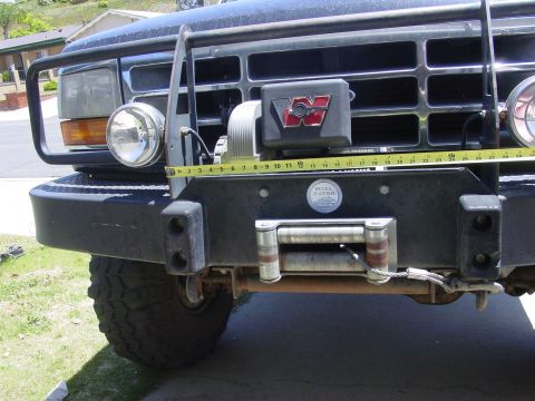 1994 Ford Bronco - Front view of a 1994 Ford Bronco showing the bumper, winch, and grille guard.