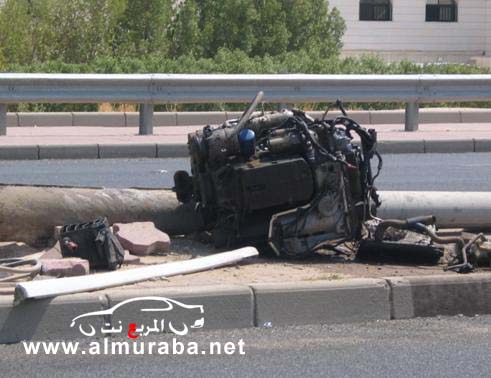 Engine block and components lying on the side of the road