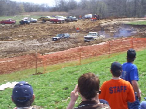 2001 Dodge 1500 - Multiple vehicles participate in a mud race event.