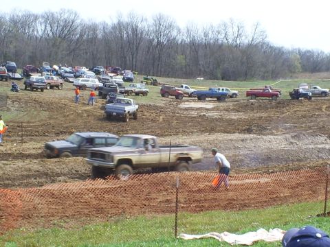 2001 Dodge 1500 - A mud race event with multiple trucks competing in the dirt track.
