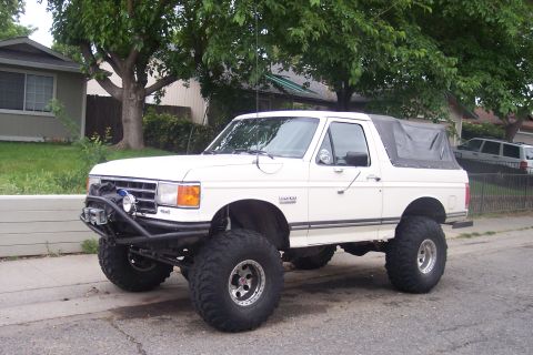 1989 Ford Bronco - This lifted 1989 Ford Bronco features a custom bumper and winch setup.