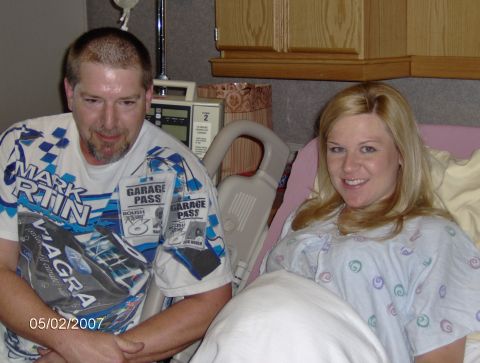 1978 Ford Bronco - A man and a woman are in a hospital room, with medical equipment visible in the background.