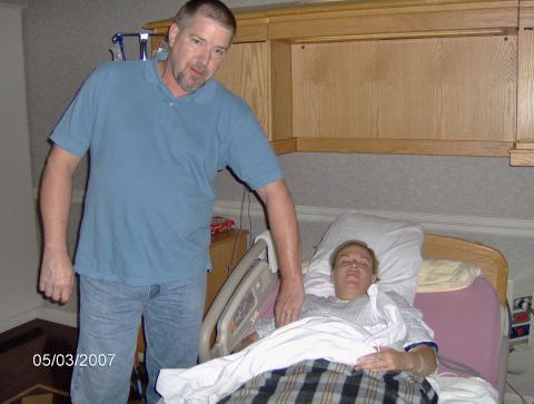 1978 Ford Bronco - A man stands next to a woman lying in a hospital bed, with the date 05/03/2007 visible in the corner.