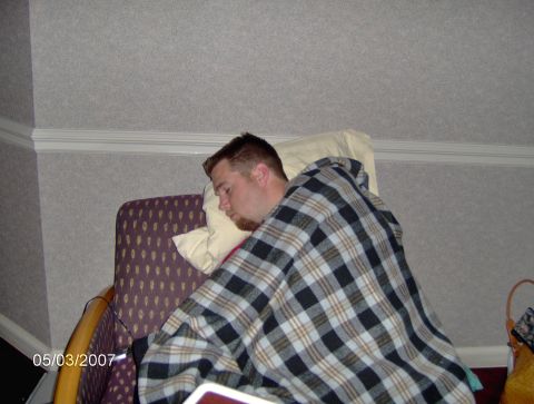 1978 Ford Bronco - Man sleeping in a chair, covered with a plaid blanket. Date stamp 05/03/2007.