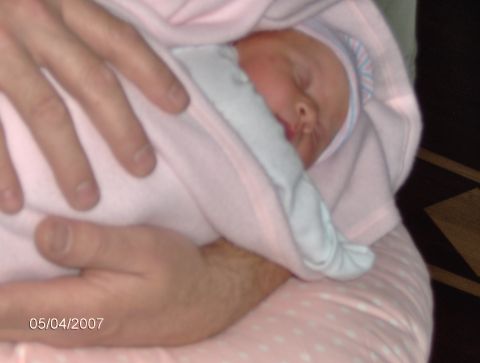 1978 Ford Bronco - A baby is swaddled in a pink blanket, sleeping peacefully. The photo has a date stamp of 05/04/2007.