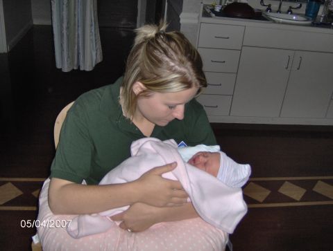 1978 Ford Bronco - Woman holding a newborn baby in a hospital room. The date stamp reads 05/04/2007.