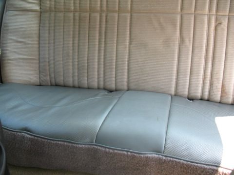 1985 Ford Crown Victoria LTD - Rear interior view of a 1985 Ford Crown Victoria LTD, showing the seat upholstery.