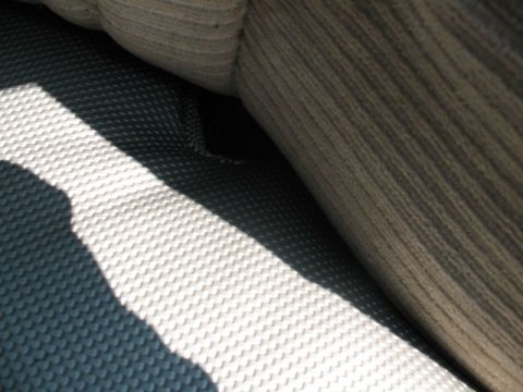 1985 Ford Crown Victoria LTD - The detail of the car's interior upholstery is visible in this close-up shot.