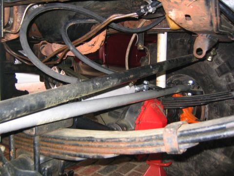 1979 Ford Bronco - Undercarriage view of suspension and steering components, possibly during a rebuild or repair.