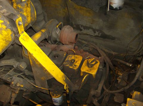 1996 Ford Probe - Close-up view of an engine compartment showing a turbocharger and associated parts.