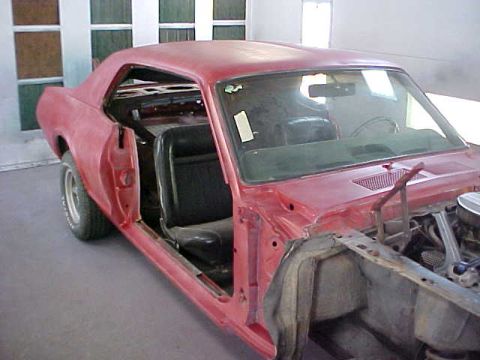 1967 Mercury Cougar - After multiple coats of high build primer the car was shot in red base coat for final block sanding.