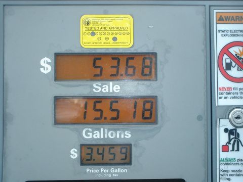 2000 Ford Crown Victoria - A gas pump display shows the total sale amount, gallons dispensed, and price per gallon.