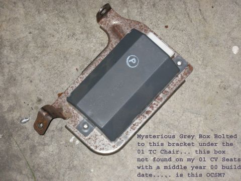2001 Ford Crown Victoria - Mysterious grey box bolted to a bracket under a 01 TC chair, not found on 01 CV seats with a middle year 00 build date.