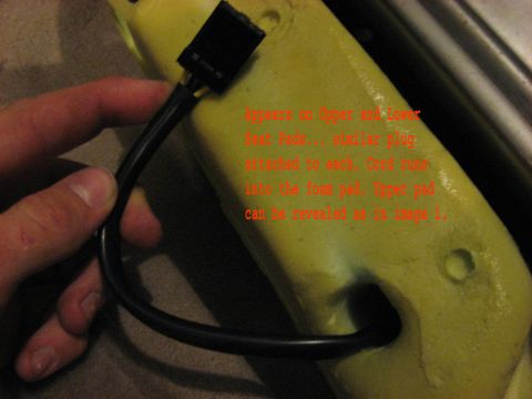 2001 Ford Crown Victoria - Close-up of seat foam showing an electrical connector and text indicating it appears on upper and lower seat pads.