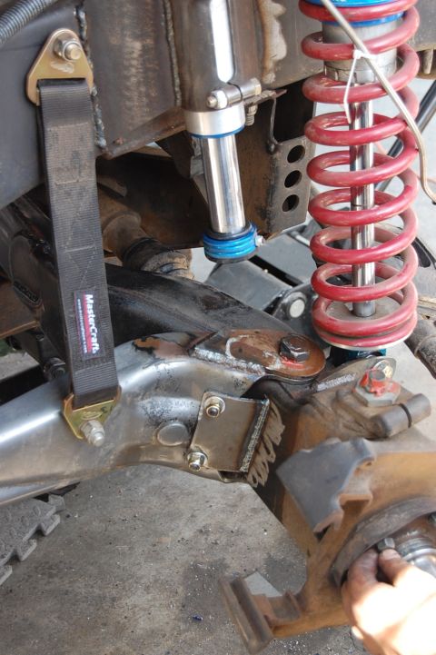 1992 Ford Explorer - Custom suspension modifications are visible in this close-up shot of off-road vehicle parts.