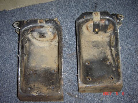 1993 Ford Bronco - Two used coil buckets, likely for a truck or SUV, are shown laid out on a carpeted surface.