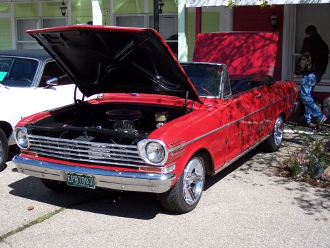 1972 Ford Ranchero - This red convertible, likely a 1966 model, has its hood open to display the engine. The license plate reads EPB7803.
