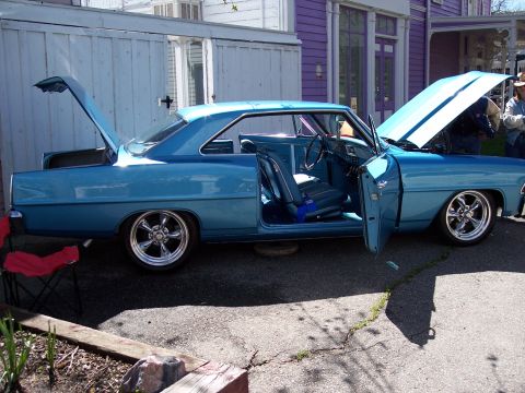 1972 Ford Ranchero - A blue coupe sits with its doors, hood, and trunk open, revealing its interior and engine.
