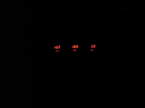 1965 Pontiac Catalina - Digital gauges display readings for voltage, temperature, and oil pressure.