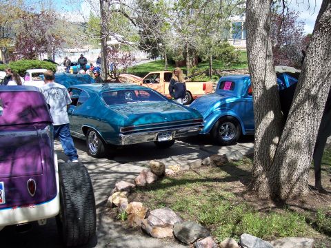 1972 Ford Ranchero - Several classic cars are parked together outdoors on a sunny day.