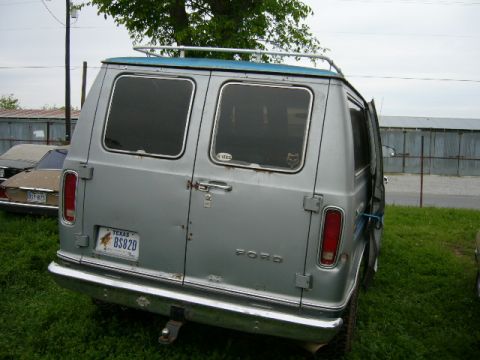 1978 Ford E250 - Rear view of a silver 1978 Ford E250 van with a blue roof and a Texas license plate.