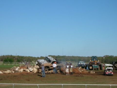 1978 Ford Bronco - Multiple off-road vehicles, including a 1979 Ford Bronco, tackle a challenging rock obstacle course.
