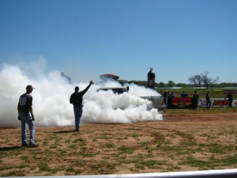 1978 Ford Bronco - Burnout event with a vehicle creating a large cloud of smoke.