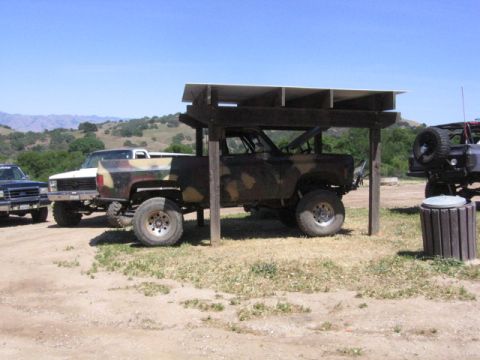 1989 Ford Bronco - Brendan cooling off in the shade.