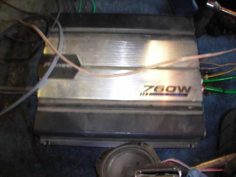 1994 Ford Bronco - A Pioneer 760W car amplifier is installed with multiple wires connected.