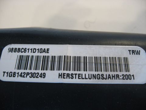 2001 Ford Crown Victoria - A label with a barcode and manufacturing year 2001 is shown.