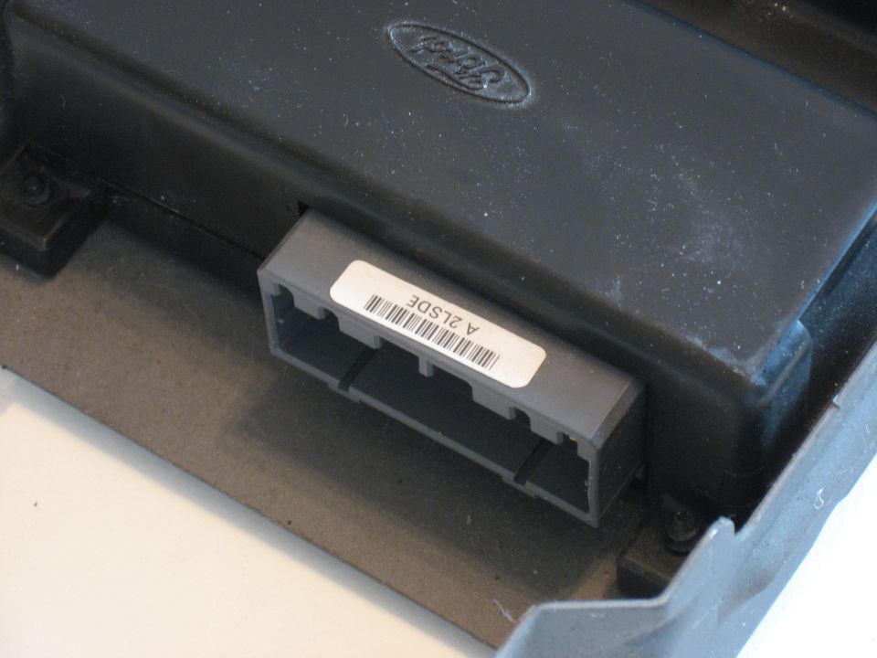 Ford electronic control unit with a label reading A 2LSDE and a barcode