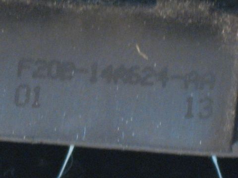 2001 Ford Crown Victoria - Component with part number F20B-14A624-AA and date codes 01 13 visible.